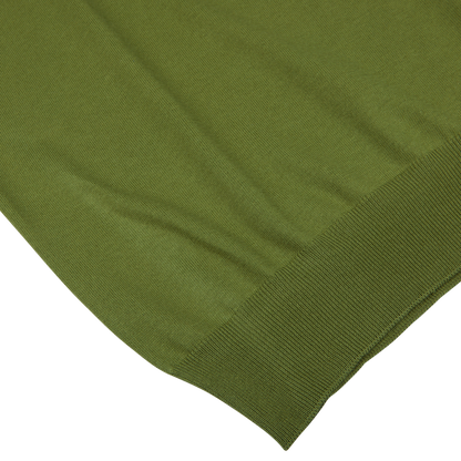 Close-up of a Gran Sasso Green Organic Cotton LS Polo Shirt with a ribbed hem on a white background.