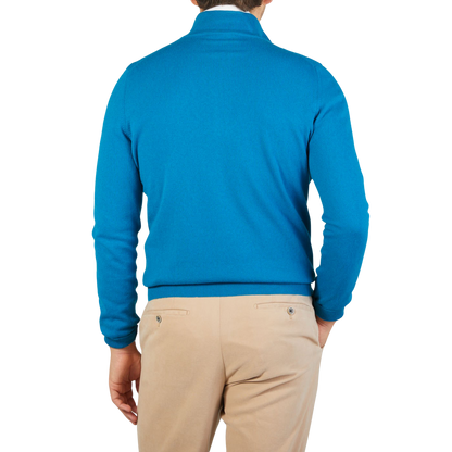 The back of a man wearing a Gran Sasso Hot Blue Cashmere 1/4 Zip Sweater.