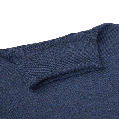 A Mid Blue Extra Fine Merino Roll Neck sweater with a roll neck by Gran Sasso.