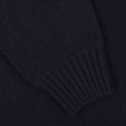 Close-up of a sleeve with ribbed cuff detail from the Navy Blue Felted Cashmere Zip Cardigan by Gran Sasso.