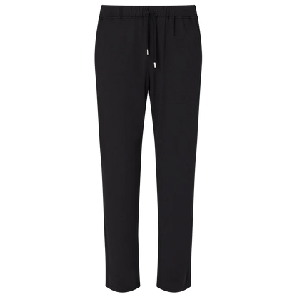 Homebody Black Modal Modern Pyjama Trousers feature a drawstring waist, no visible pockets, and a smooth, lightweight feel. These comfortable full-length pants have a clean hem, ideal for both casual and semi-formal wear. , available at Richard Gelding Mayfair