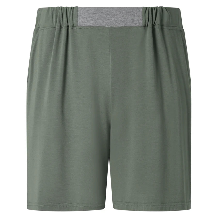 The Homebody Charred Green Modal Wimbledon Shorts feature an elastic waistband, grey back panel, and two side pockets. Made from breathable fabric for a relaxed fit, they're perfect for casual or athletic wear with no visible logos or patterns. , available at Richard Gelding Mayfair