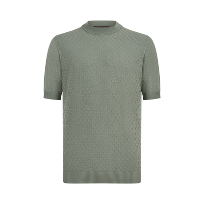 The Filippo de Laurentiis Sage 3D Weave Crepe Cotton T-Shirt features a mock neckline, short sleeves, subtle diamond pattern, and ribbed cuffs and hem, shown against a plain white background. , available at Richard Gelding Mayfair