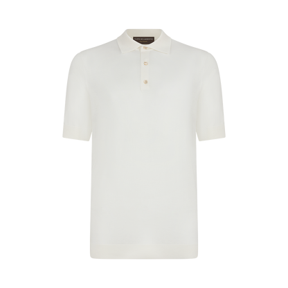 The Filippo de Laurentiis Cream Sea Island Cotton Polo Shirt is a luxury short-sleeve polo with a classic collar and three light buttons, featuring a minimal design without logos or patterns, shown on a white background. , available at Richard Gelding Mayfair