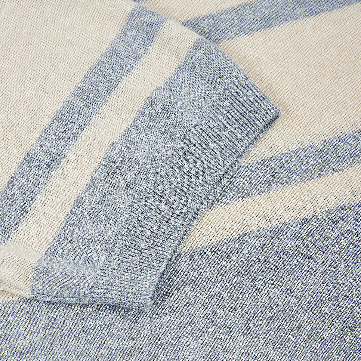 A close-up of the Gran Sasso Grey Stripe Cotton/Linen Knitted T-shirt highlights its soft textured fabric and pale blue and cream stripes—ideal inspiration for a men's breathable shirt. , available at Richard Gelding Mayfair