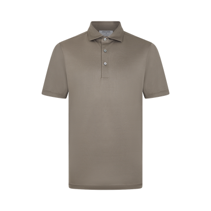 The Gran Sasso Taupe Filo Scozia Polo features short sleeves, a classic collar, and a two-button placket. , available at Richard Gelding Mayfair