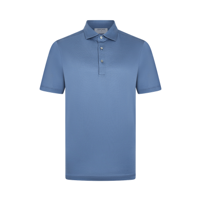 The Blueberry Navy Filo Scozia Polo by Gran Sasso is a men's short-sleeved shirt made from premium filo scozia cotton, featuring a pointed collar and three-button placket with pearlescent buttons. , available at Richard Gelding Mayfair