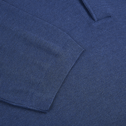 Close-up of a Gran Sasso Navy Blue Silk Pique Polo, highlighting the textured fine-knit pattern and ribbed cuff contrasting with the smoother main fabric, all in a rich, deep navy blue. , available at Richard Gelding Mayfair
