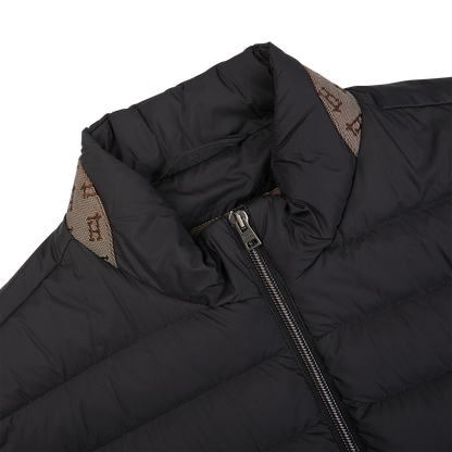 An Italian outerwear Herno black nylon goose down quilted gilet with a zippered collar.