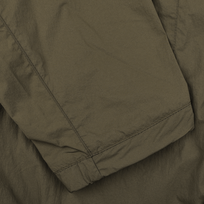 Close-up of the Herno Dark Green Ultralight Nylon Field Jacket, featuring visible stitching and seams for wind and rain resistance.