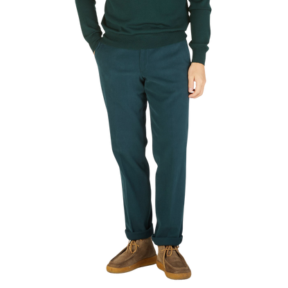 A man wearing Hiltl's Airforce Blue Cotton Stretch Regular Fit Chinos.