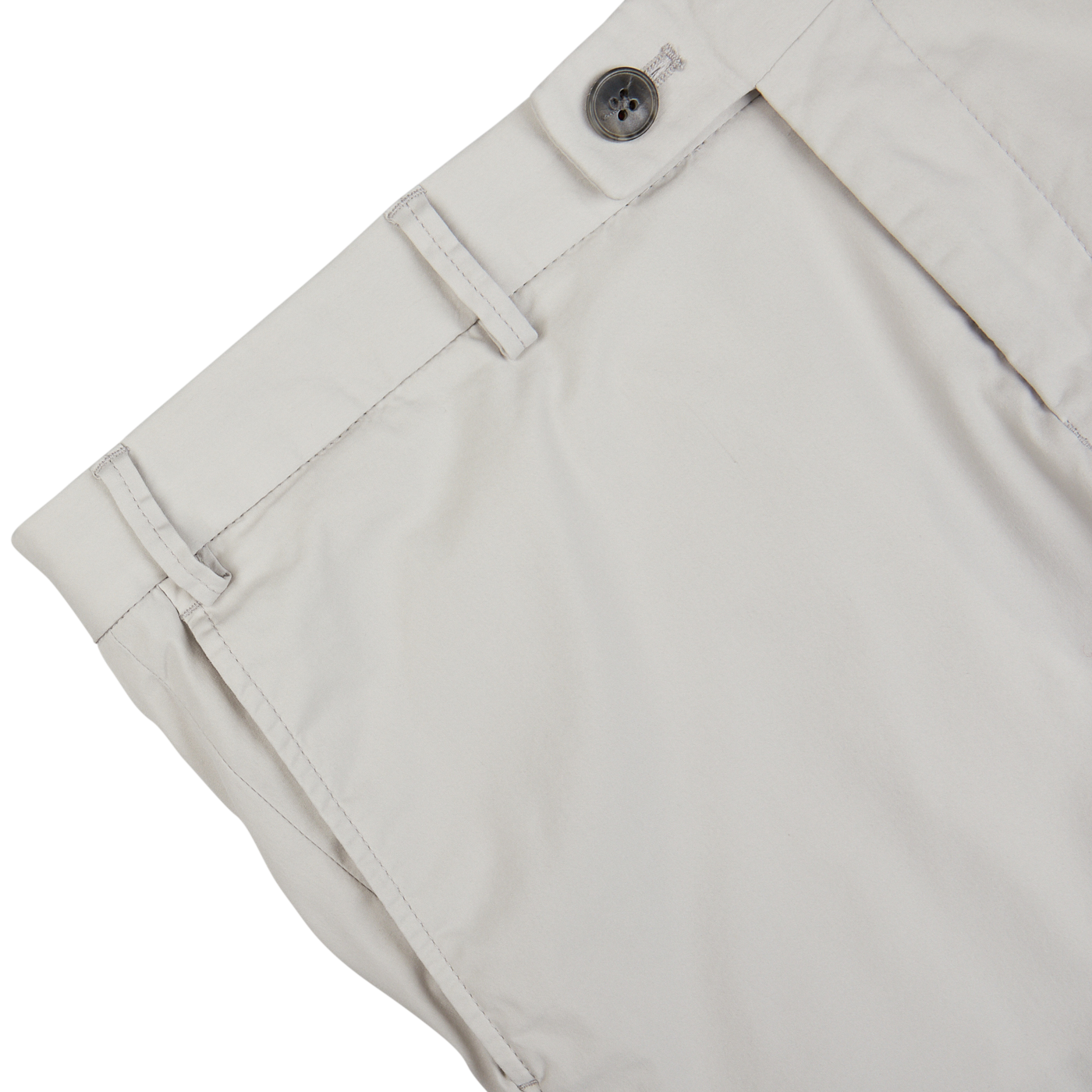 Close-up view of a Hiltl Cream Beige Cotton Nylon Slim Chinos waistband with button closure.
