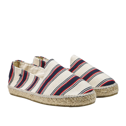 A pair of striped Manebi Red Navy Striped Portofino Cotton Espadrilles on a transparent background.