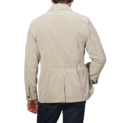 A person is shown from the back in a Manto Khaki Beige Ultrafine Microfibre Safari Jacket and dark jeans against a neutral background.