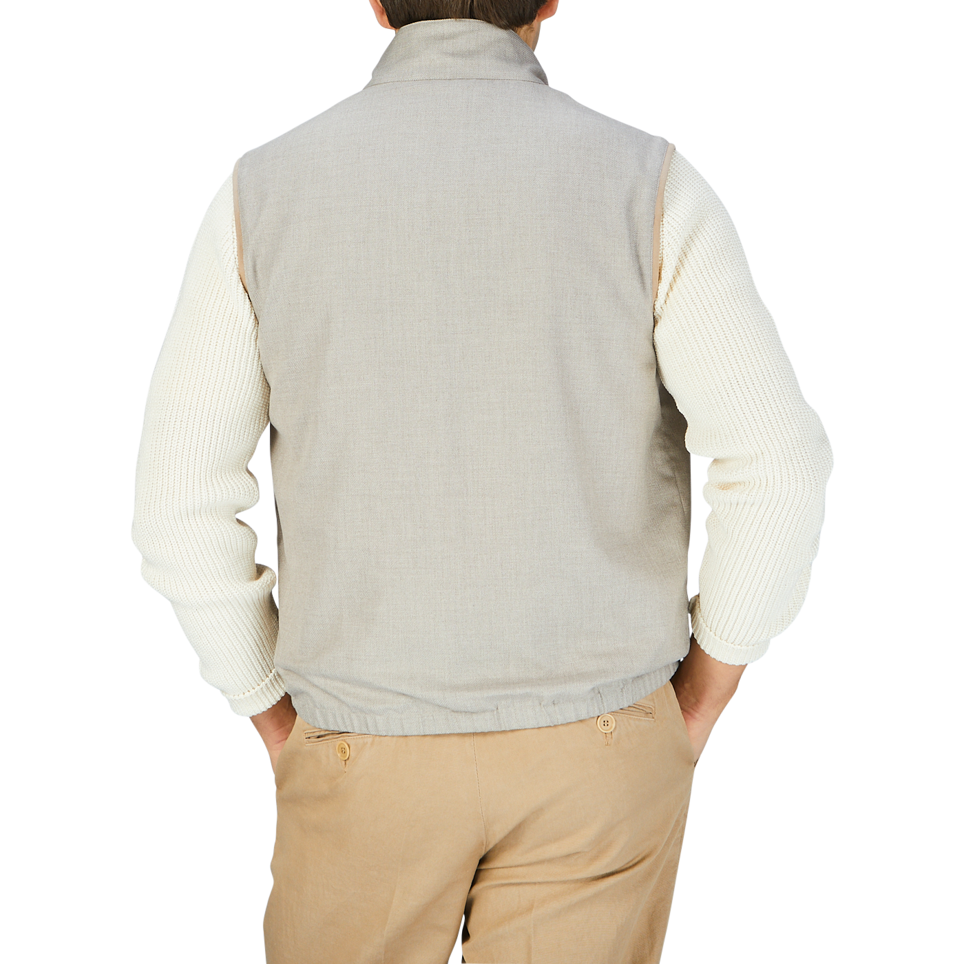 The man is wearing a Manto Beige Reversible Loro Piana Cashpima Gilet and tan pants.