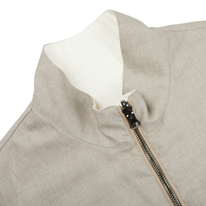 The back of a weather-resistant Manto beige reversible Loro Piana Cashpima Gilet with a zipper.