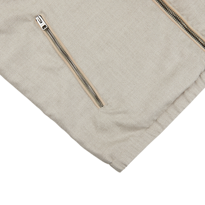 A weather-resistant Beige Reversible Loro Piana Cashpima Gilet with a zipper on the side by Manto.