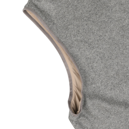 Close-up of the Manto Grey Beige Cashmere Nylon Reversible Gilet showing the armhole and inner lining detail. The fabric appears soft and textured.