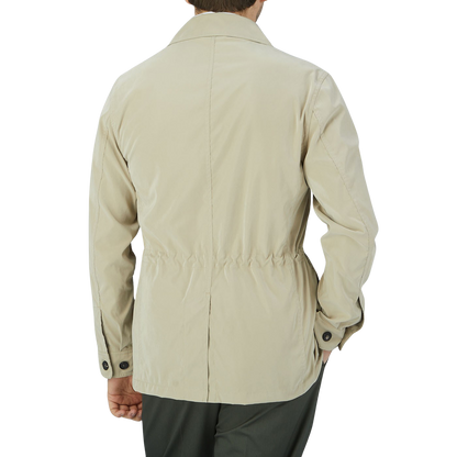 The slim fit man wearing a Manto Khaki Beige Ultrafine Microfiber Safari Jacket.