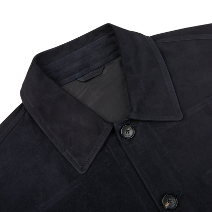 A close up of a Manto navy blue suede leather overshirt.