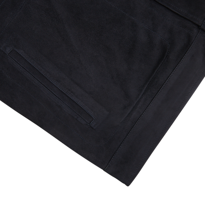 A close up of a Manto navy blue suede leather overshirt.