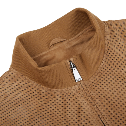 An exquisite Manto Tobacco Brown Perforated Suede Leather Blouson jacket featuring perforated suede leather.