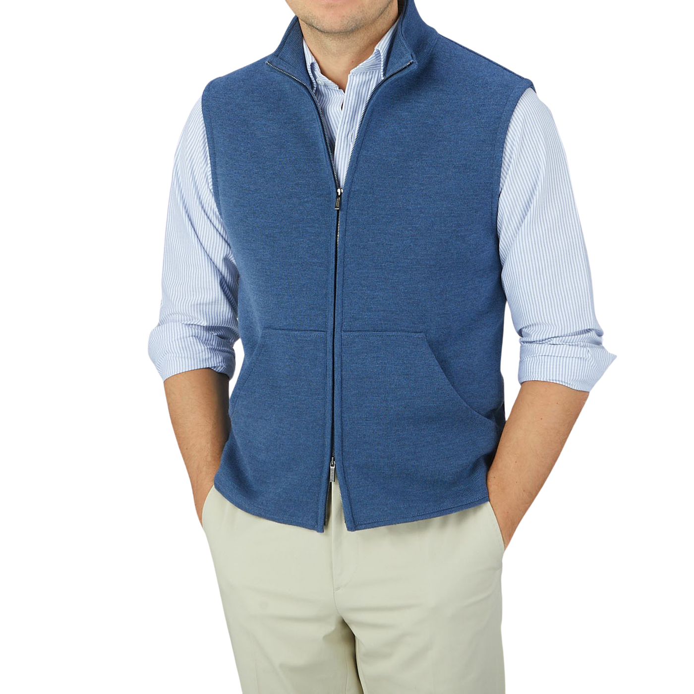 A man wearing a Maurizio Baldassari Denim Blue Milano Stitch Wool Zip Gilet and tan pants.
