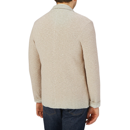 The back view of a man wearing a Maurizio Baldassari Beige Melange Cotton Mouline Knitted Jacket.