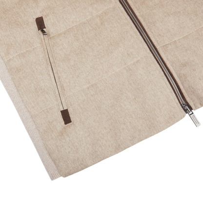 A contemporary Beige Water Repellent Pure Cashmere Gilet by Maurizio Baldassari with brown zippers.