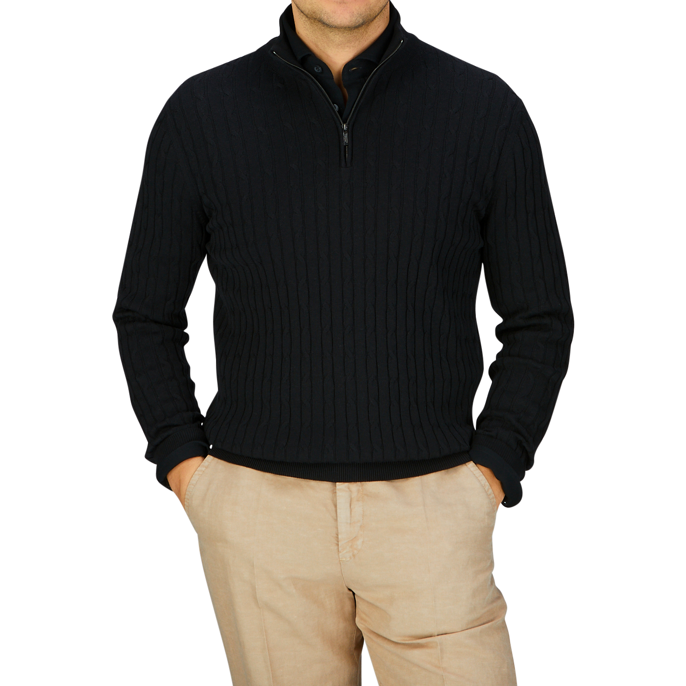 Man wearing a Black Cotton Silk Cable-Knit 1/4 Zip Sweater by Maurizio Baldassari and beige pants.