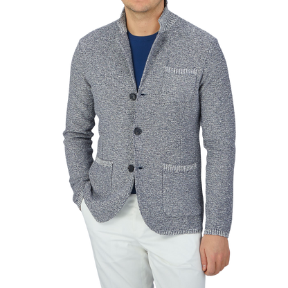 A man wearing a Maurizio Baldassari Blue Melange Cotton Mouline Knitted Jacket.