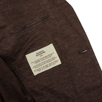 A Maurizio Baldassari Brown Melange Wool Linen Silk Jersey Blazer with a label on it.