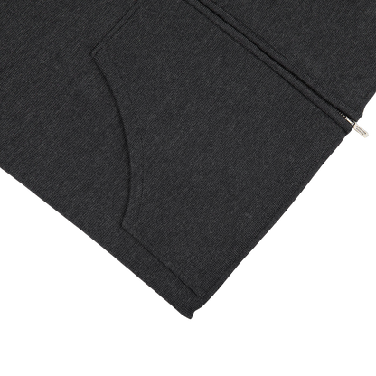 A Maurizio Baldassari Charcoal Grey Milano Stitch Wool Zip Gilet with a zipper on the side.