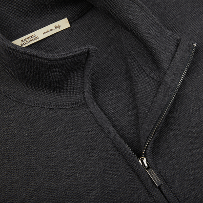 A close up of a charcoal grey Maurizio Baldassari Milano Stitch Wool Zip Gilet.