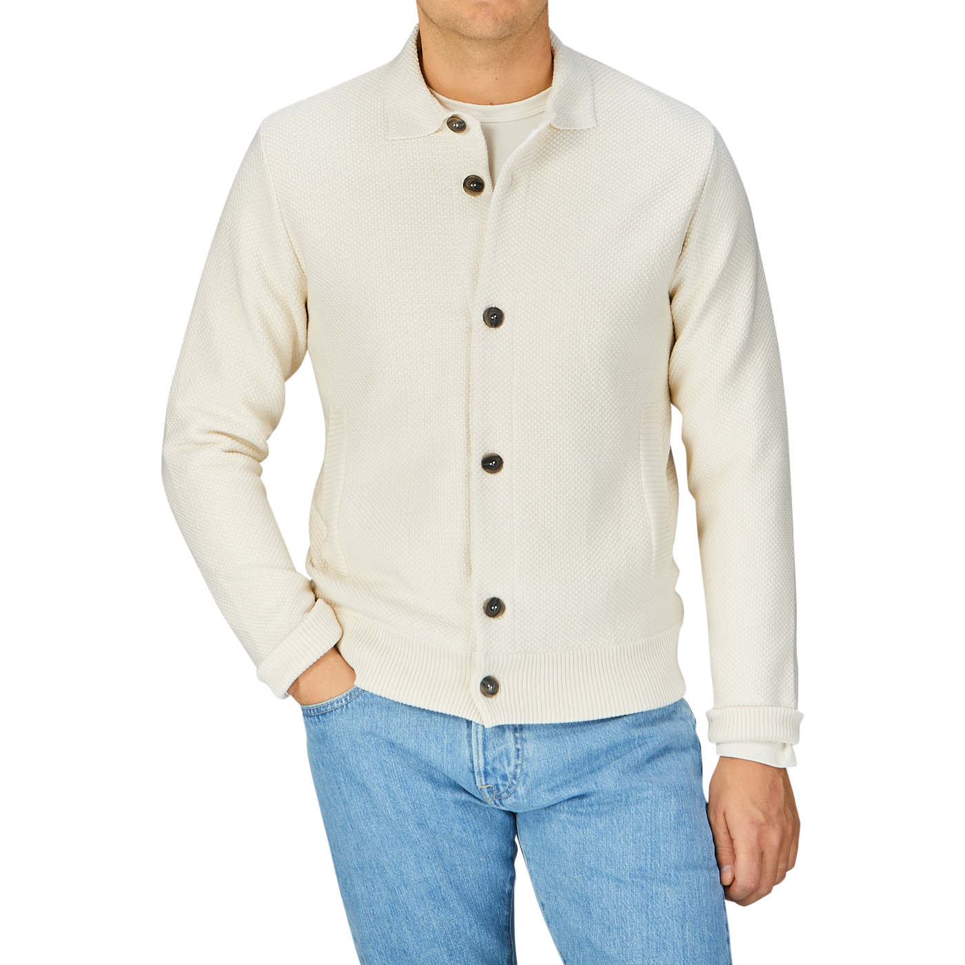 Man wearing a Maurizio Baldassari Cream Beige Silk Cotton Knitted Blouson and blue jeans.