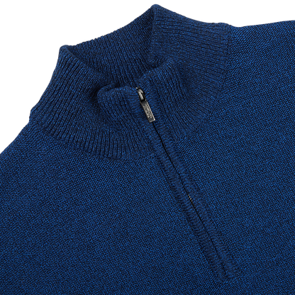 A close up of a Maurizio Baldassari Denim Blue Cotton Mouline 1/4 Zip Sweater.