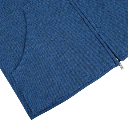 A Maurizio Baldassari Denim Blue Milano Stitch Wool Zip Gilet with a zippered pocket.