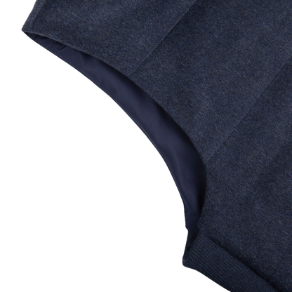 A close up of a Maurizio Baldassari Denim Blue Water Repellent Pure Cashmere Gilet.