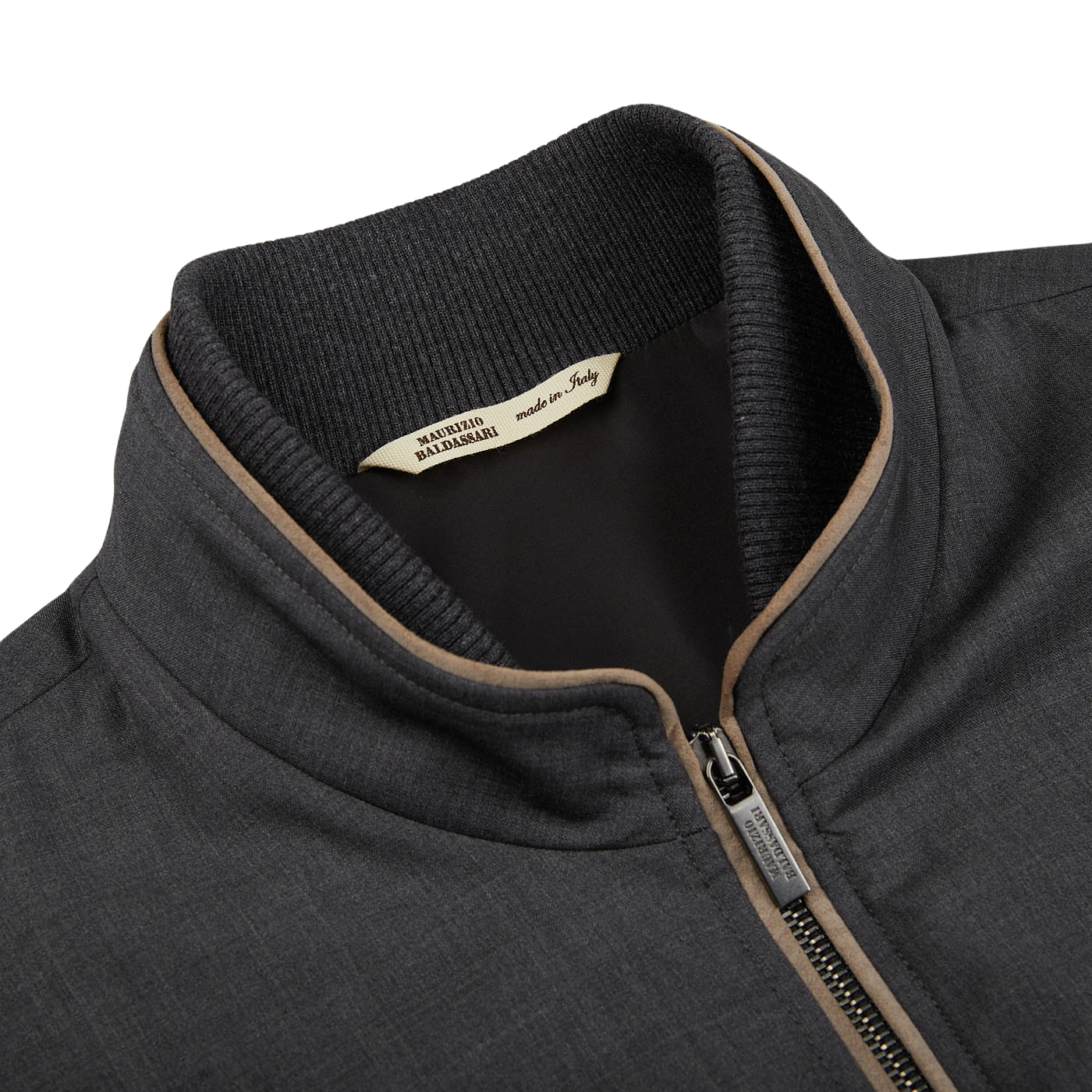 A Maurizio Baldassari Charcoal Grey Merino Wool Travel Gilet with a zipper on the front made from light merino wool.