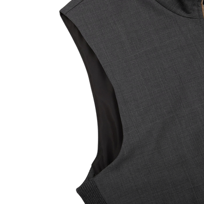 A Charcoal Grey Merino Wool Travel Gilet by Maurizio Baldassari on a white background.