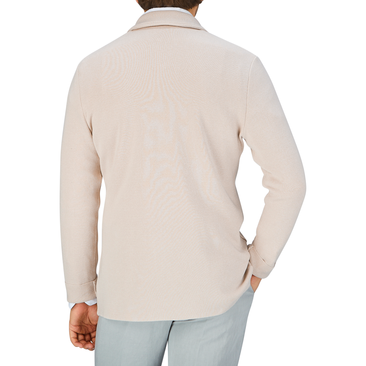 A person wearing a Maurizio Baldassari light beige, silk-cotton blend turtleneck sweater, viewed from the back.