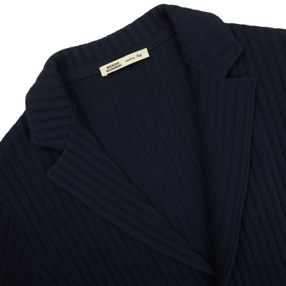 A close up of a Navy Blue Organic Cotton Rib Stitched Swacket by Maurizio Baldassari.