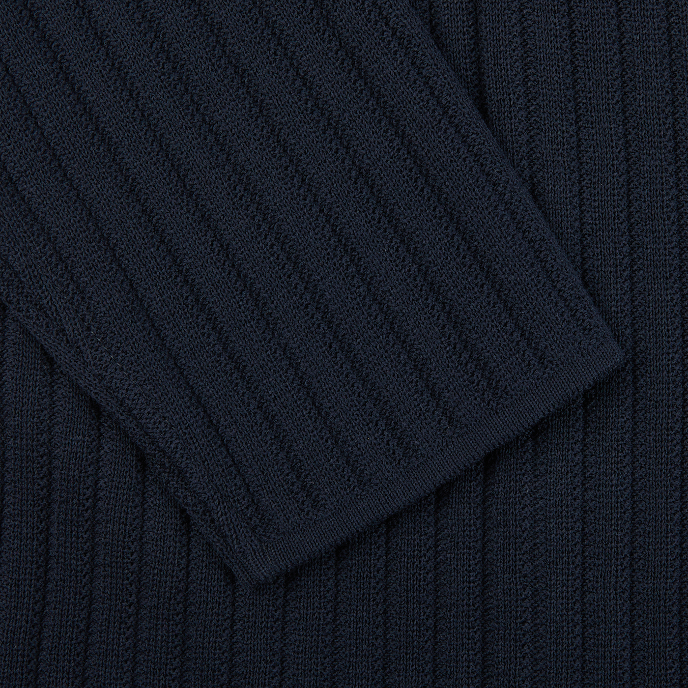 A close up of a Maurizio Baldassari Navy Blue Organic Cotton Rib Stitched Swacket.