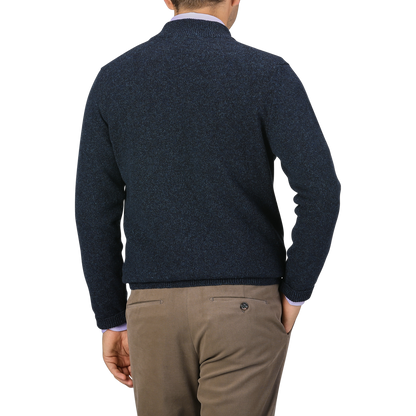 A person shown from the back wearing a Maurizio Baldassari Navy Winter Wool Mouline 1/4 Zip Sweater and tan trousers against a neutral background.