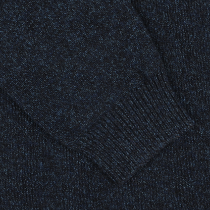 A close-up view of a ribbed-cuff sleeve from the Navy Winter Wool Mouline 1/4 Zip Sweater by Maurizio Baldassari.