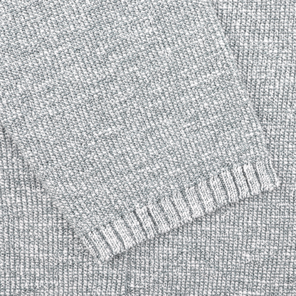 Close-up of a sleeve from the Sky Blue Summer Mouline Knitted Jacket by Maurizio Baldassari, highlighting the ribbed cuff and textured cotton-viscose blend fabric that exudes relaxed luxury.