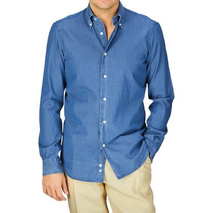 Man wearing a Dark Denim Washed Cotton BD Regular Fit Shirt by Mazzarelli and beige pants.