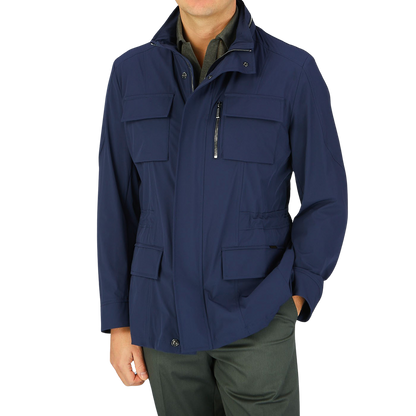 A man wearing the Moorer Dark Blue Lightweight Nylon Field Jacket.