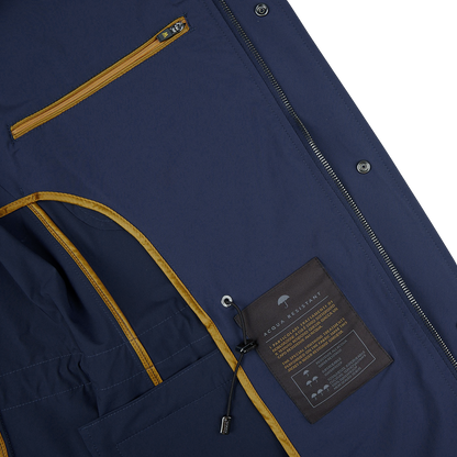 A Moorer Dark Blue Lightweight Nylon Field Jacket with a zippered pocket.