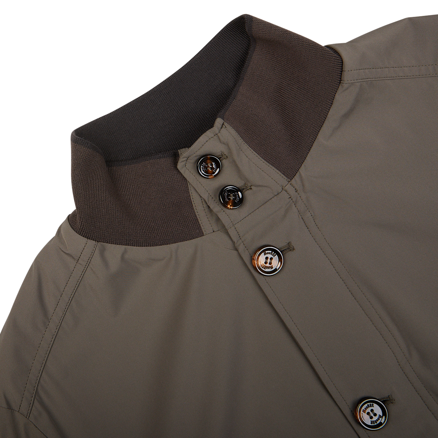Close-up of a luxurious Olive Green Technical Nylon Blouson jacket collar with buttons by Moorer.